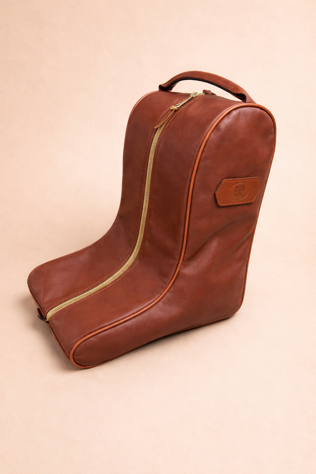 Brown leather boot bag with gold zipper 